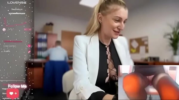 Gorgeous madam masturbates in the office